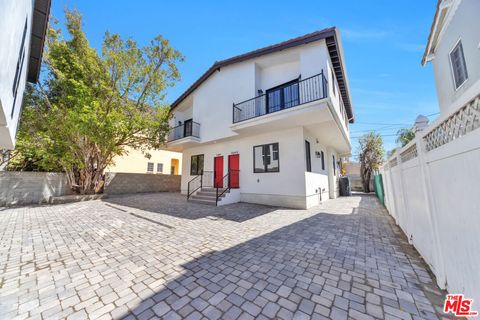 Photo of 1024 S Masselin Avenue, Los Angeles, CA 90019 (MLS # 26673825)