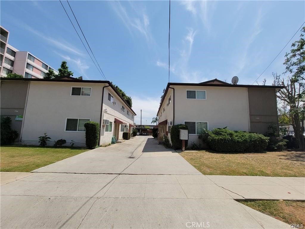 Lovely townhouse style unit located in the heart of Alhambra city. Walking distance to downtown of Alhambra. You can find theater, shopping center, groceries, restaurants and banks everywhere around the property. The unit offers an open floorplan, good size living room open to the dining area and kitchen with a 1/2 bath on the 1st floor. 2 bedrooms with a bath on the 2nd floor. The unit had been completely remodel about a year ago, including freshly paint with new wood-like water proof vinyl through out the 1st and 2nd floor. Newer kitchen cabinets, bathroom vanities and light fixtures. Newer double pane windows and sliding door. 2 assigned carport parking spaces. Must see to appreciated!