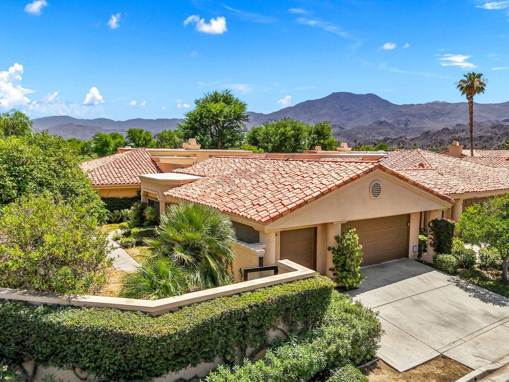 This is a fantastic PGA West unit with Southern mountain views and overlooks the 5th hole of the famed Stadium Course, home of the PGA tours American Express tournament. This gorgeous remodeled, turnkey furnished home has 4 bedrooms, 3 and a half bathrooms and is conveniently located next to a pool and spa. Outdoor living at its finest with a large private side yard and an expansive rear patio complete with built in BBQ and fire pit to take in the phenomenal views. This is desert living at its finest.