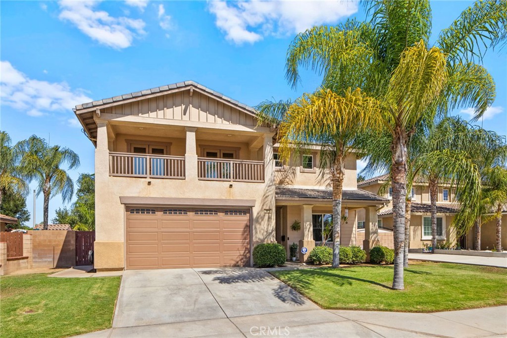 Welcome to this meticulously maintained home, purchased directly from the builder and built in 2005. This spacious two-story residence offers 4 bedrooms, 3 bathrooms, and 2,743 sq. ft. of living space on a 7,405 sq. ft. lot. The home features a bedroom and bathroom on the first floor, ideal for guests or multi-generational living. The dining area is currently set up as an office, and all windows are polarized for comfort and privacy. Step outside to a resort-style backyard with a built-in pool resurfaced approximately two years ago, turf, two patio covers, two built-in propane BBQs, and two ceiling fans, perfect for entertaining. Potential space on both sides of the home offers RV or vehicle storage (buyer to verify suitability and compliance). Inside, enjoy ample natural light throughout the home. The primary bedroom upstairs is expansive with flexible space, ideal for an additional bedroom, nursery, or office. Two of the upstairs bedrooms share a balcony, each with their own access doors, and there is a spacious den upstairs as well. A built-in desk is conveniently located in the hallway. The living room features a cozy fireplace, and the kitchen boasts a custom island with seating, built-in oven, dishwasher, and opens to the living room. The laundry room is located downstairs with built-in shelving. The primary bathroom includes a huge walk-in closet, soaking tub with a custom privacy window, double sinks, and a vanity area. The interior was freshly painted last month, and the home includes 18-panel leased solar for energy efficiency. With a tandem 3-car garage and abundant upgrades throughout, this home is ready to welcome its new owners!