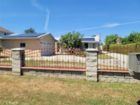 Photo of 15827 Fairgrove Ave, La Puente, CA 91744 (MLS # WS26087668)