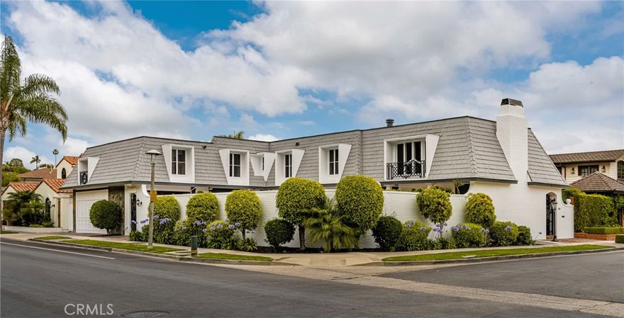Timeless Mid-Century Estate in Dover Shores, Welcome to 508 Evening Star—an extraordinary opportunity to own a true original in the prestigious Dover Shores neighborhood of Newport Beach. Built in 1966 and lovingly maintained, this 7-bedroom, 6.5-bathroom home spans nearly 5,000 square feet and offers a rare blend of size, craftsmanship, and character that is nearly impossible to replicate today.



Situated on a quiet, tree-lined street, the home showcases exceptional original details throughout—including handcrafted paint brush spray finishes, crown molding with wood inlays, and rich parquet flooring.  Constructed with extensive use of premium redwood, the home exudes warmth and timeless quality.



The formal entry is anchored by a beautifully preserved original iron staircase with striking brass railings, setting the tone for the home’s distinctive design. Generous living and dining areas offer ideal spaces for entertaining with multiple fireplaces in the living, family and primary rooms- adding charm and inviting ambiance throughout the home. The kitchen and multiple flexible-use rooms provide endless potential for modern updates or preservation.



The primary suite serves as a luxurious retreat with a spa-like bath and a peaceful ambiance ideal for unwinding. A separate powder room with closet space enhances privacy, functionality and flow. This thoughtful layout adds convenience for daily routines while offering a touch of refined luxury that elevates the entire suite.



Step outside to a serene backyard oasis featuring a 25,000-gallon pool framed by blossoming pear trees and mature landscaping—perfect for relaxing, entertaining, or family gatherings. As part of the Dover Shores community, residents enjoy access to two private beaches, enhancing the idyllic coastal lifestyle.



Located just minutes from top-rated schools, the scenic Back Bay, and world-class shopping and dining at Westcliff and Fashion Island, 508 Evening Star is more than a home—it’s a legacy property ready for its next chapter.