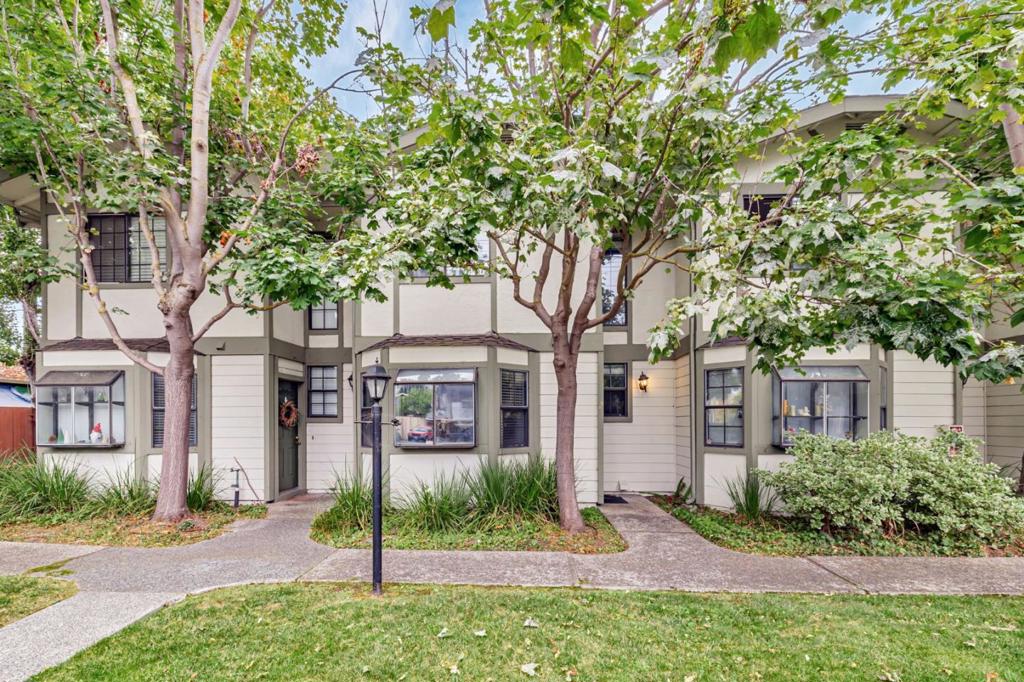 Discover this beautifully appointed 2BD / 2.5BA townhome-style condo perfectly situated in one of Mountain Views most sought-after neighborhoods. Designed for comfort and convenience, this spacious two-story residence features: A primary suite with a generous walk-in closet, second en-suite bedroom for guests or family Modern kitchen with stainless steel appliances and granite countertops In-unit washer/dryer for everyday ease Private patio and balcony ideal for morning coffee or evening gatherings Tucked away on a quiet, tree-lined street just steps from Evandale and Devonshire Parks, this home also includes a detached 1-car garage and an additional reserved parking space. Enjoy top-rated Mountain View schools and unmatched Silicon Valley access just minutes from Google, Microsoft, NASA, and other major tech campuses. With Caltrain, Light Rail, Stevens Creek Trail, and Highways 101, 85 & 237 all nearby, this home offers the perfect blend of tranquility and connectivity.