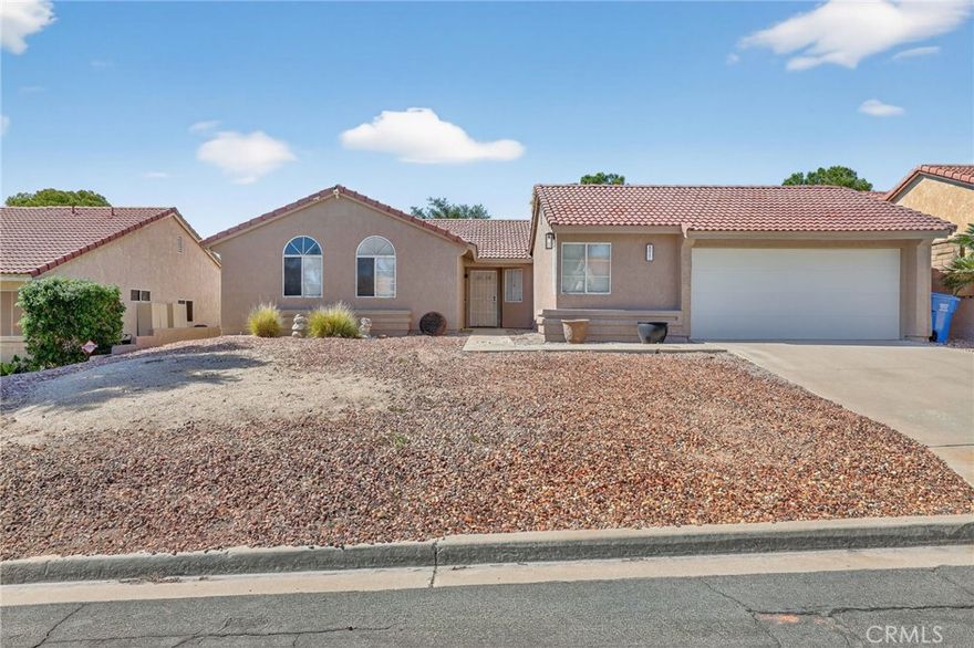 Location, Location, Location!

Welcome to the highly sought-after Mission Lakes Country Club! This charming home offers comfort, convenience, and stunning views all in one package. Featuring a spacious 2-car garage, high ceilings, and sleek laminate flooring throughout, the home is designed for both style and functionality.



The open living room boasts a cozy fireplace and two sliding glass doors that seamlessly connect indoor living to the serene backyard—perfect for relaxing or entertaining. Step outside and take in breathtaking mountain views and the lush greenery of the private, gated golf course. Located near the seventh hole, this property is a golfer’s dream.



Enjoy unlimited golf as an HOA member, along with access to the fantastic amenities Mission Lakes has to offer. With central AC/heat and a prime location, this home has everything you need for comfortable desert living.