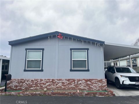 Photo of 9080 Bloomfield Ave #108, Cypress, CA 90630 (MLS # PW26067182)