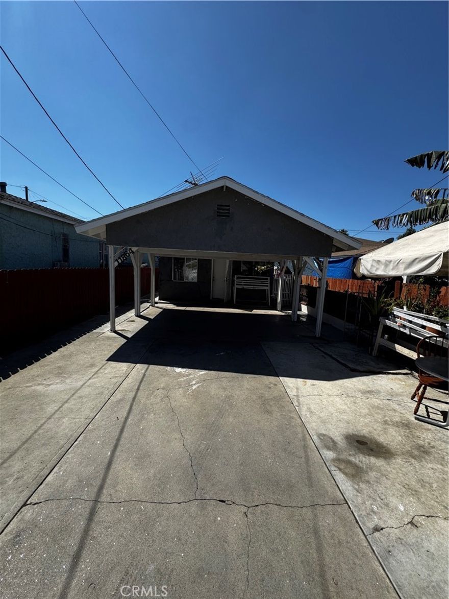 Cozy 2 bed, 1 bath home! Excellent opportunity for first time home buyers to buy in a great area of Norwalk. Spacious back yard with banana & avocado trees that give nice shade. Large car port in front of house, can park up to 4 cars.
