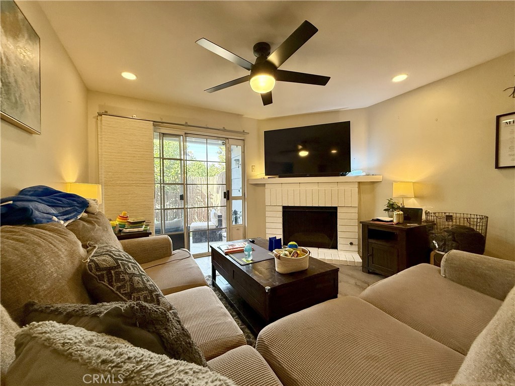 Welcome to this Main level Condominium in a Prime Location of Orangethorpe Village offering an open floor plan. Location offers easy access, location privacy and pool view. The floor plan offers two huge bedrooms and two bathrooms. You won't believe the amount of space the bedrooms offer. Each of the bdrms are situated on the either side of the living room, dining area and kitchen. The living room has a gas burning fireplace and a sliding glass door leading out to the patio. The patio offers plenty of room for outdoor entertaining as well as storage. The Laundry area is conveniently located in a private room off the patio. This corner unit offers pleasing views of the association pool and jacuzzi. Upgrades include new flooring, recessed lighting, new stove/double oven, full counter to cabinet backsplash in kitchen, dishwasher and microwave, fresh paint, new toilets, and 3 new top notch ceiling fans in both bedrooms and in the living room. A/C and Heat upgraded in May 2022 and water heater was upgraded in 2023. Extra parking space can be purchased through the HOA. HOA pays for water, trash, pool, jacuzzi, exterior maintenance, and yard. Come see this beautiful unit and make it yours!