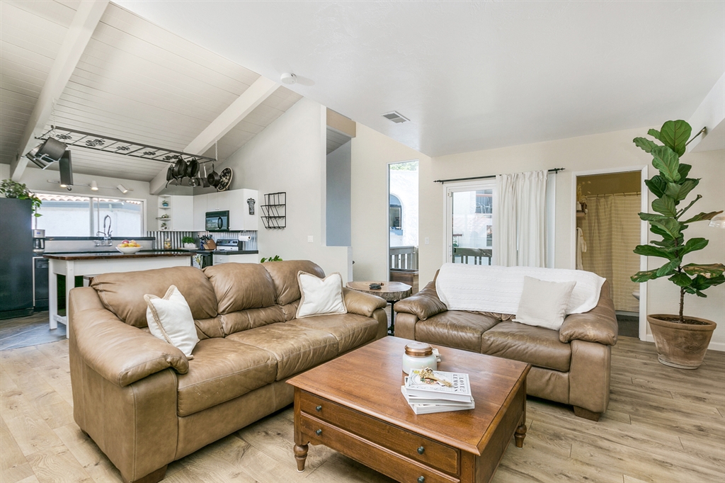 PRIME COASTAL GOLF COURSE LOCATION! Beautiful & private town home in the highly sought after community of La Costa. 2BR/2BA 1,263 sqft vaulted open beam ceilings & generous windows provide light & bright living with an excellent, open floor plan. Entry level Master bedroom includes walk-in closet, a glimpse of the golf course & custom wood barn door. Freshly painted, new wood flooring, kitchen w/ industrial sink & new faucet, walk-in pantry & more! Large upstairs bedroom has walk-in closet. A MUST SEE! Coastal living at its finest! Minutes from the beach, shopping, restaurants, schools Omni La Costa Resort and Golf Course and much more. Attached one car garage includes washer and dryer, new tankless water heater and storage shelves. All appliances convey with property. Deck is scheduled to be refinished, already had approval from the HOA. HOA includes a walls in insurance policy.. Neighborhoods: La Costa Equipment: Dryer,Garage Door Opener Other Fees: 0 Sewer: Sewer Connected Topography: GSL