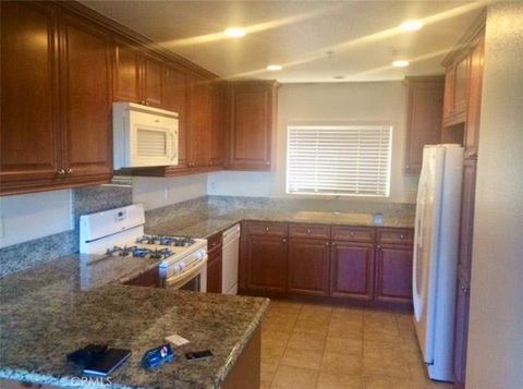 Photo of 2818 Green River Rd Rd #102, Corona, CA 92882 (MLS # PW26080519)