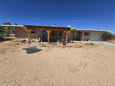 Photo of 3390 El Dorado Ave, Yucca Valley, CA 92284 (MLS # CV26082754)