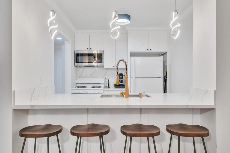 Welcome to this stylish and move-in ready end unit studio. Perfect for first-time buyers! Step into homeownership with this beautifully remodeled unit, located in a serene and amenity-rich gated community with a view of a beautiful water feature. The studio has 477 square feet of thoughtfully updated space. This charming home features new quartz countertops, a fully remodeled bathroom and modern wood-look tile flooring throughout. As an end unit, you’ll appreciate the added privacy with only one shared wall and no neighbors on one side. Step out onto your private patio and enjoy the tranquil views of a peaceful water feature. The perfect spot to relax and unwind! This lush, park-like community is filled with scenic man made lakes, streams, ponds and walking paths surrounded by mature trees. You will feel transported to the peaceful setting of Big Bear within the mountain town inspired community. Residents enjoy resort-style amenities including tennis courts, a sparkling pool and spa, clubhouse, fitness center and even a gated pet-friendly area. Conveniently located near shopping, dining, entertainment and public transportation with easy access to the 605, 105, 5 and 91 freeways–this location makes commuting a breeze. Whether you’re starting your journey as a homeowner or looking for an easy, low-maintenance lifestyle, this stylish studio has it all. Don’t miss out–schedule your private showing today!