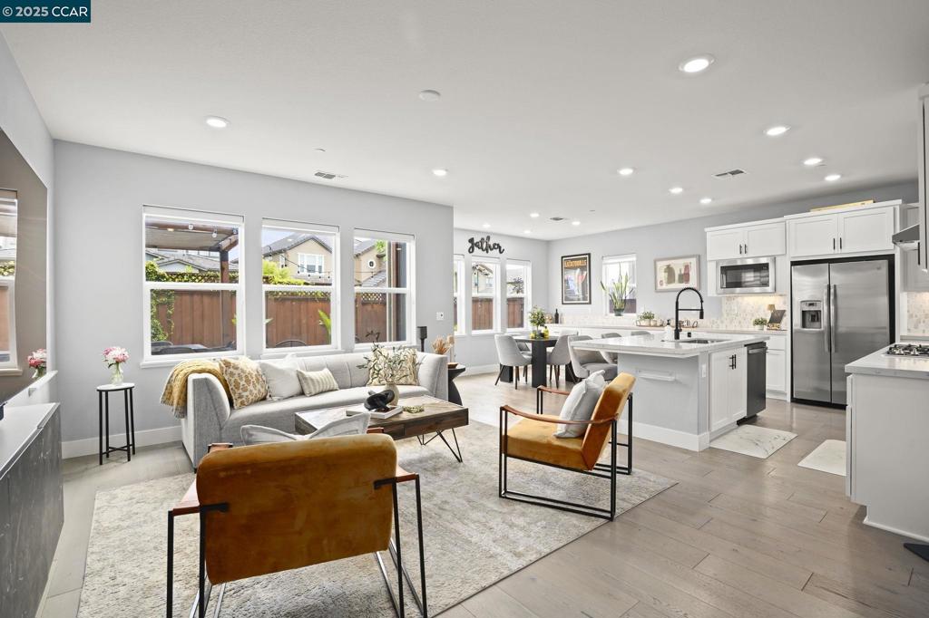Modern Luxury Home with Easy City Commute – Located in The PRESERVE Discover this beautifully upgraded 4-bedroom, 2.5-uniquely situated on a quiet court for added privacy and charm. Designed for the modern lifestyle, the open-concept layout is filled with natural light and thoughtful touches throughout. Enjoy over $30,000 in premium upgrades, including smart home technology, a solar energy system, and an EV charging station. The gourmet kitchen features quartz countertops, stainless steel appliances, and custom millwork. Step into your cozy, custom-designed backyard—perfect for relaxing evenings or entertaining guests. Commuter-friendly location with quick access to major freeways making travel to San Francisco, Oakland, and Silicon Valley a breeze. The PRESERVE community offers resort-style amenities, including a large swimming pool, bocce ball courts, and a 12.7-acre park with scenic hiking and biking trails. All just minutes from top-rated schools, shopping, dining, and entertainment. A rare opportunity to enjoy luxury, comfort, and convenience—all in one home.