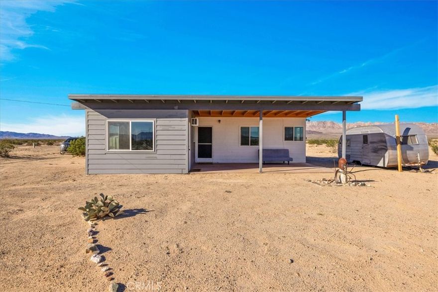 Escape to your own slice of high desert heaven in this adorable 1-bedroom, 1-bath single-family retreat nestled in the heart of Wonder Valley. With a charming retro vibe and timeless character, this cozy home offers the perfect blend of vintage flair and serene solitude.

 Features You'll Love:

Spacious picture window framing breathtaking mountain views. Classic retro finishes that evoke mid-century charm. Open living area with natural light and desert warmth. Private bedroom with peaceful ambiance. On site laundry. Expansive lot offering true seclusion and starry night skies with large South facing patio.



Whether you're seeking a weekend getaway, artist’s hideout, or full-time desert dwelling, this property delivers tranquility, inspiration, and a front-row seat to nature’s beauty. Just a short drive from Joshua Tree National Park, yet worlds away from the hustle.

Come experience the magic of Wonder Valley—where the sunsets are cinematic and the silence is golden.