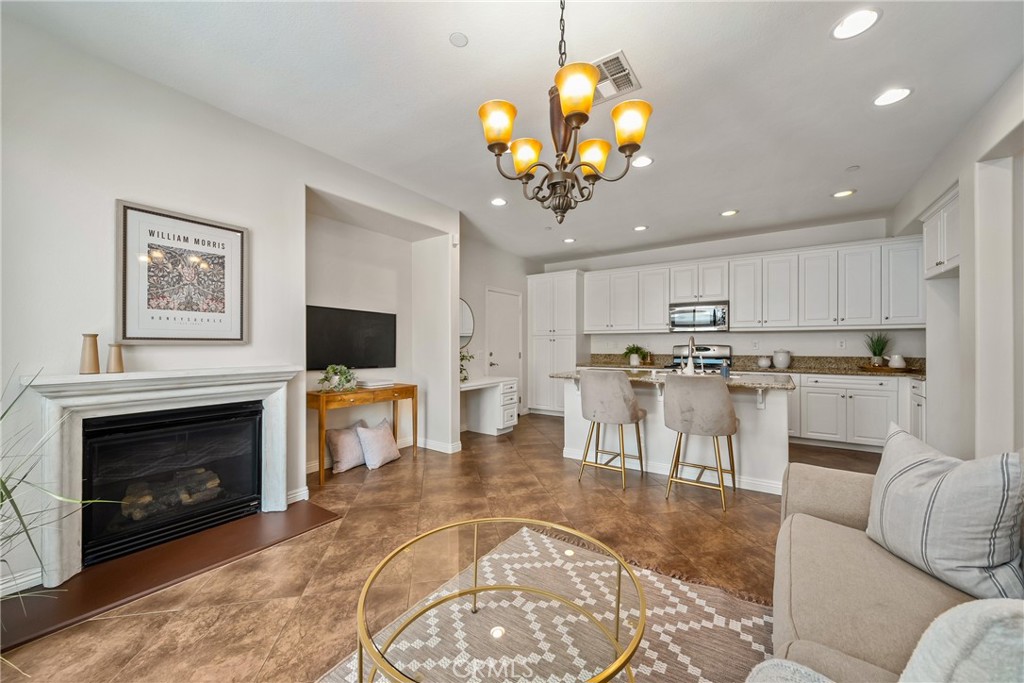 This stylish 4 bed, 3 bath, end unit offers 2,075 square feet of bright, open living space, in the gated community of Serafina.
Inside, you’ll find granite countertops, fresh paint, a cozy fireplace, beautiful upgrades and a Puronics water softener. The upstairs loft with built-in desk is ready for your home office, study or additional family room. The primary suite features a chic barn door and ensuite bath, while all bedrooms are generously sized with mirrored closet doors. Bonus points for the upstairs laundry room.
Outside, you can enjoy both a private front patio and a very roomy side patio, perfect for morning coffee or weekend hangs. The attached two car garage, with keypad access, with direct access into the kitchen.
Community perks include a pool, basketball court, playgrounds, BBQ areas, and gated entry. Water and trash are covered by the HOA. In the heart of the city, you are minutes away from the best, shopping, restaurants, gyms and more. A rare blend of space, style, and convenience.
This home has been immaculately maintained; you're sure to fall in love. Come check it out.