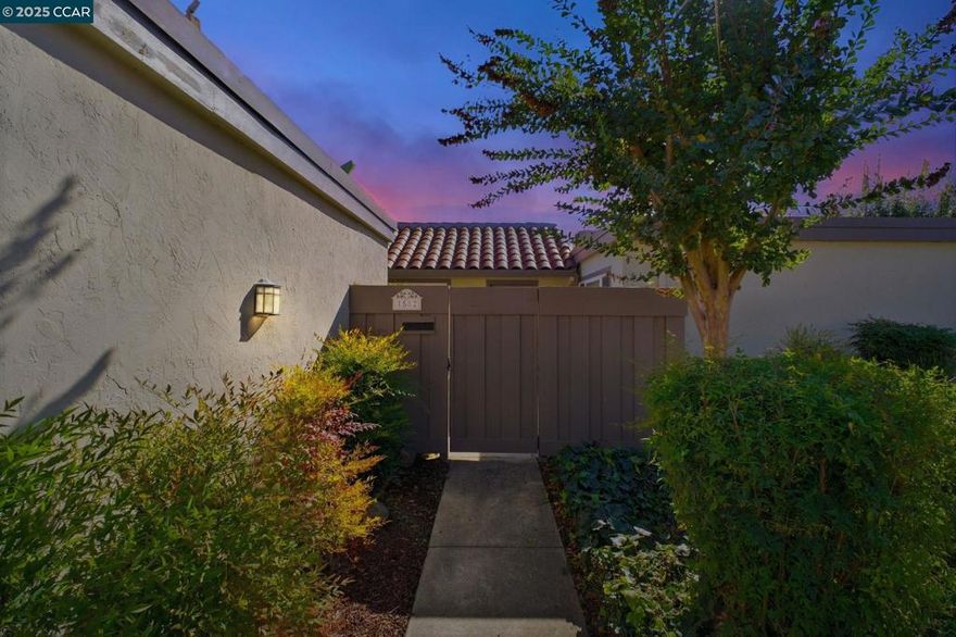 This Stunning Rarely Available Single Story Townhome tucked back from the street has been beautifully updated and meticulously maintained! Prime location walking distance to Historic Downtown Pleasanton and nestled near the Pleasanton foothills! You will find the Utmost in Privacy and Outstanding Condition, this home has it all! Only one shared wall and it's the garage wall! LVP flooring throughout, crown molding, kitchen with quartz counters and matching backsplash, walnut cabinetry,  new stove/range with glass cooktop, New Microwave, Bosch dishwasher and under cabinet and ceiling LED illumination. Large primary suit with remodeled bathroom/shower, mirrored closet doors and custom closet organizers. New ceiling fans, primary and secondary electrical panels have been upgraded. Two car attached garage, with new EV charging outlet. The washer, dryer and refrigerator are included. Rear yard has a covered patio with custom Pergola, lush landscapes with many beautiful flowers, shrubs and a plum tree. Beautiful community pool with cabana and bathrooms and also has an RV/Boat storage area. Walk to downtown restaurants, shops, concerts in the park, farmers markets and more! Walk to the fair, close to freeway access, shopping, high ranking schools, hiking/biking trails and parks.