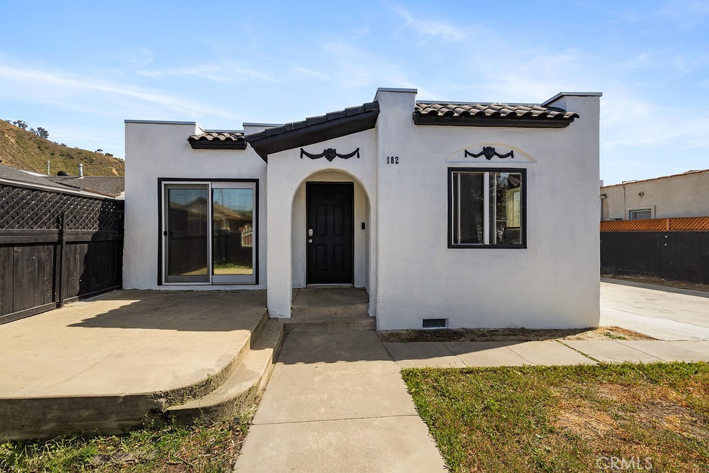 Welcome to 182/184 E Macfarlane Drive — a charming Spanish-style duplex just blocks from the beach in one of Ventura’s most desirable neighborhoods. This unique property features two separate homes plus a bonus suite on one lot, and will be delivered vacant, offering ultimate flexibility for investors, multi-generational living, or owner-occupants looking to offset their mortgage with rental income. The front home features 3 spacious bedrooms and 1 bathrooms, showcasing classic Spanish architectural details such as arched doorways, textured stucco, and tile roofing. The rear unit offers 2 bedrooms and 1 bathroom, ideal as a guesthouse, rental unit, or home office. In addition, the property includes a bonus suite with a full bathroom and it's own private entrance—perfect for use as a studio rental, in-law quarters, or creative workspace. Enjoy the ocean breeze, walkability to the beach, parks, cafes, and Ventura’s vibrant downtown. With all units delivered vacant, this is a move-in ready or rent- ready opportunity in a sought-after beachside community.