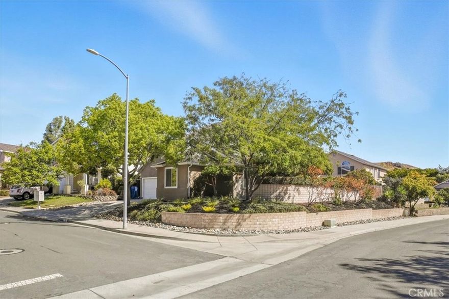 Welcome to this beautifully updated single-level home on a private corner lot in the desirable Arbors neighborhood. This three-bedroom, two-bath residence offers a comfortable, functional layout with thoughtful upgrades throughout. Step inside to discover high ceilings and engineered hard-wood flooring that flows seamlessly through the entire home. The remodeled kitchen features granite countertops, a glass tile backsplash, a Fisher & Paykel two-drawer dishwasher, and ample drawers and pull-out shelving for maximum convenience. The primary suite includes a customized walk-in closet and a refreshed en-suite bath. Additional highlights include a whole house fan, central air conditioning, and a professionally landscaped, low-maintenance yard. The freshly painted, spacious two-car garage offers built-in storage cabinets. Located in an established community known for its parks and miles of scenic walking trails, this home offers the perfect blend of privacy and neighborhood charm. Don’t miss the opportunity to make this move-in ready home yours.
