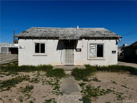 Photo of 310 Walnut St, Needles, CA 92363 (MLS # JT26018386)
