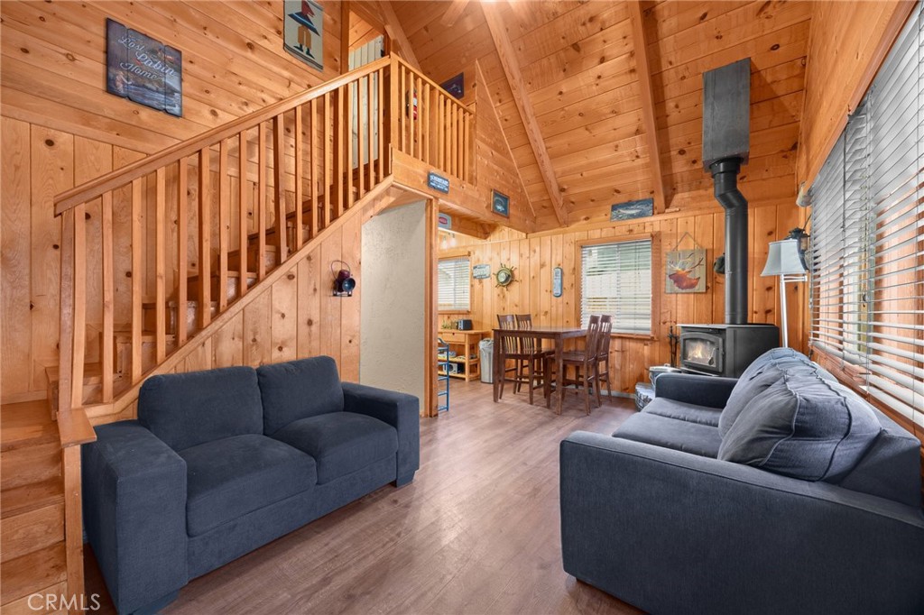 Charming Mountain Retreat in the Heart of Sugarloaf!
Welcome to this cozy and inviting 2-bedroom, 1-bathroom cabin offering 637 sq ft of comfortable living space on a 2,500 sq ft lot. Perfectly blending rustic charm with modern convenience, the home features warm wood accents, an efficient layout, and a fireplace that creates the perfect setting for relaxing evenings after a day of mountain adventure.
This property offers several thoughtful upgrades that set it apart. It’s connected to a natural gas line—a rare find in the area where many homes rely on propane—making it a more convenient and cost-effective option for heating and cooking. The fully fenced backyard provides privacy, security, and a great space for kids or pets to enjoy. You'll also appreciate the flush-out plumbing valve, designed to prevent standing water in the pipes when the home is unoccupied—ideal for part-time living or seasonal stays.
Bonus: This cabin is short-term rental (STR) approved and currently managed by Cool Cabins, making it an excellent turnkey investment property, mountain escape, or both!
Located just minutes from Big Bear Lake, hiking and biking trails, ski resorts, and local shops and eateries—this mountain gem combines comfort, charm, and income potential. Don’t miss your chance to own a piece of paradise in Sugarloaf!