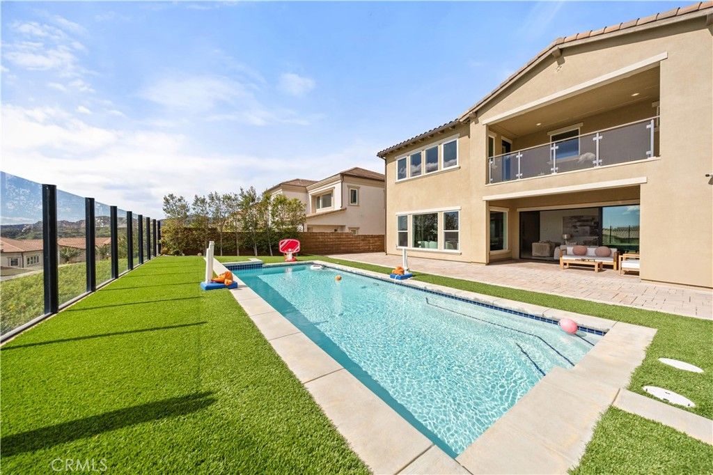 Photo of 20564 W Bluebird Court, Porter Ranch, CA 91326 (MLS # OC26045406)