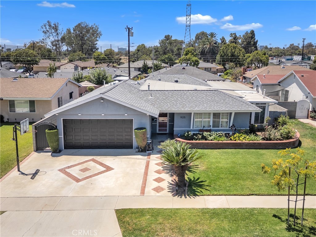 Check out this beautifully remodeled, 4 bedroom, 2 bath North Carson stunner! The open-concept kitchen is perfect for hanging out, with sleek wood cabinetry, a breakfast bar, tons of granite counter space, and direct access to the garage with a private laundry area—super convenient! As you walk in, you're greeted by luxury vinyl flooring and a spacious formal living room that's perfect for relaxing or entertaining. The huge primary bedroom is complete with a massive walk-in closet and a stunningly remodeled en-suite bath, providing your own personal retreat. The other three generously sized bedrooms are just steps away from a stylish double-sink bathroom with a separate tub and shower that’s perfect for family or guests. Need extra space?! This home has 2 sunrooms that are perfect for an office, workout area, kids play space or whatever you can dream up! The private backyard has patio and grass areas as well as many fruit trees and is perfect for hosting gatherings. This home also boasts cool extras like recessed lighting, a skylight, a newer roof, a 200amp electrical system, a tankless water heater, double pane windows, and a water filtration system. It’s move-in ready and packed with features that make everyday living a breeze! Located close to great shopping, schools and freeways.