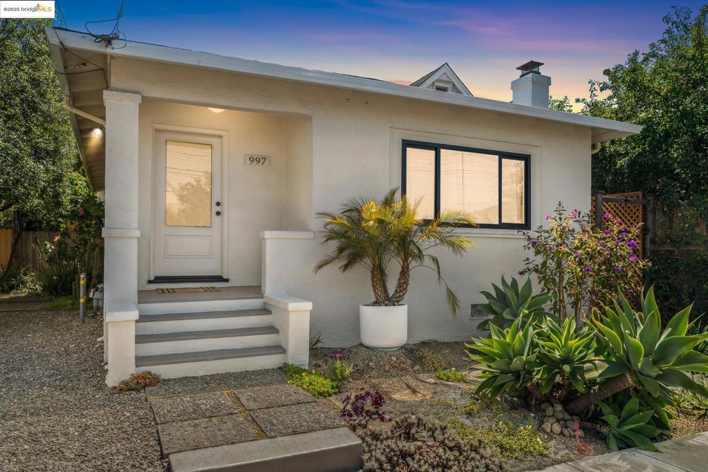 Located in the heart of the Santa Fe Neighborhood, this charming 2+ BD, 1 BA Bungalow will entice you from first glance! Airy and bright, the living room is highlighted by tall ceilings, fresh paint and refinished HWF. The formal dining room has been refreshed with newer windows and a modern light fixture, while keeping its charm with the original built-in buffet. The eat-in kitchen shines with its sleek Carrara Marble countertops, farmhouse-style sink, large refrigerator and high-end chef’s stove. Off the kitchen is a charming sunroom! This is the perfect place for morning coffee or afternoon tea. The two spacious bedrooms have been refreshed with new paint, refinished hardwood floors and newer light fixtures. Each room is framed by large windows which bring in views of the gorgeous greenery. The stylish hall bathroom has been renovated in the same era of the home! You will be delighted by the black-and-white subway tile, porcelain pedestal sink and gleaming chrome fixtures. Fenced-for-privacy, the landscaped backyard showcases multiple seating areas, a raised garden bed, a lovely succulent garden and multiple blooming flowers. Additional space can be found in the detached studio, perfect for a home office. A long driveway ensures that there is always off street parking.