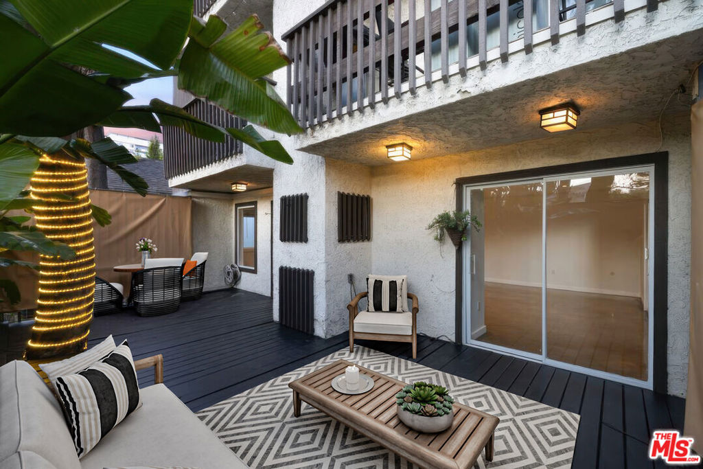 Discover the perfect blend of modern elegance and serene outdoor living in this 2-bedroom, 2-bathroom condo, located in the coveted Norma Triangle of West Hollywood. This light-filled end unit offers polished cement floors, updated appliances, in-unit laundry, central heat/AC, and no common walls for ultimate privacy. The expansive private zen patio creates an oasis for relaxation and entertainment, seamlessly blending indoor and outdoor spaces. With two assigned side-by-side parking spaces and a prime location just minutes from Beverly Hills and West Hollywood's top dining, shopping, and entertainment, this home is a rare find in one of LA's most sought-after neighborhoods.