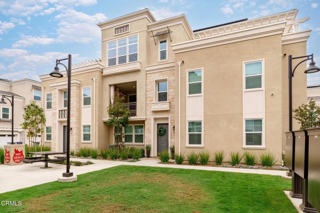 Live, Work, Play, and Thrive! Welcome to this newly built 4 bedroom, 3.5 bathroom townhome located in the desirable master planned community of Park Place 2 at Wagon Wheel. This stunning tri-level home features a flexible floor plan with a downstairs bedroom and en-suite bathroom, perfect for guests, home office, or multigenerational living. The main level offers open-concept living with high ceilings, a modern kitchen with stainless steel appliances, a spacious island, and a stylish dining area. Enjoy outdoor living on the covered balcony, ideal for relaxing or entertaining. Upstairs, the luxurious primary suite features a large walk-in closet and spa-like bathroom with dual vanities. Two additional bedrooms, a full bathroom, and an upstairs laundry room. Located in a vibrant and walkable community near beaches, parks, walking trails, and The Collection at River Park. Just minutes to dining, shopping, and 101 Freeway. Don't miss your chance to own in one of Ventura County's fastest-growing and most dynamic neighborhoods!
