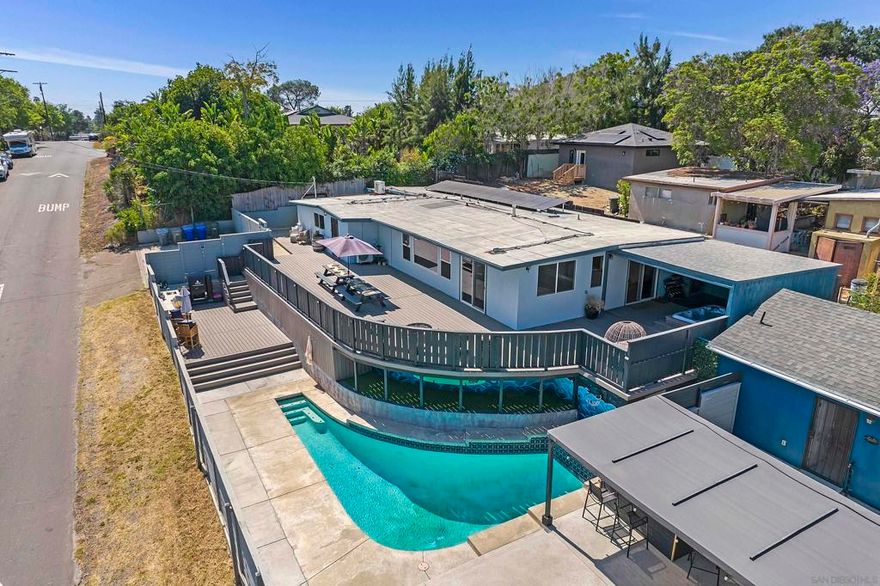 Over $400k in upgrades since 2020!  The stunning, remodeled, 2,152 sqft main house features 4 BR / 2 BA and oversized office (5th BR) and offers a separate & private fully detached, permitted, 487 sqft. studio ADU w/ washer/dryer, exclusive use yard & driveway.  Paid for solar.  Designer eat in kitchen, huge outdoor deck and fully fenced outdoor area including a 17' x 10' outdoor kitchen equipped with MasterBuilt Gravity smoker, Bull BBQ / Side Burner & outdoor sink, swimming pool and 8' x 6' bar & seating area make this an entertainer's dream!  This property is the perfect home for the indoor / outdoor Southern California lifestyle.  Mature citrus trees (Blood/Navel Orange & Lemon) adorn the pristine grassy outdoor garden area.  Large master bedroom w/ custom built closets & new master bath.  Spa & outdoor gym area (covered).  Private and quiet.