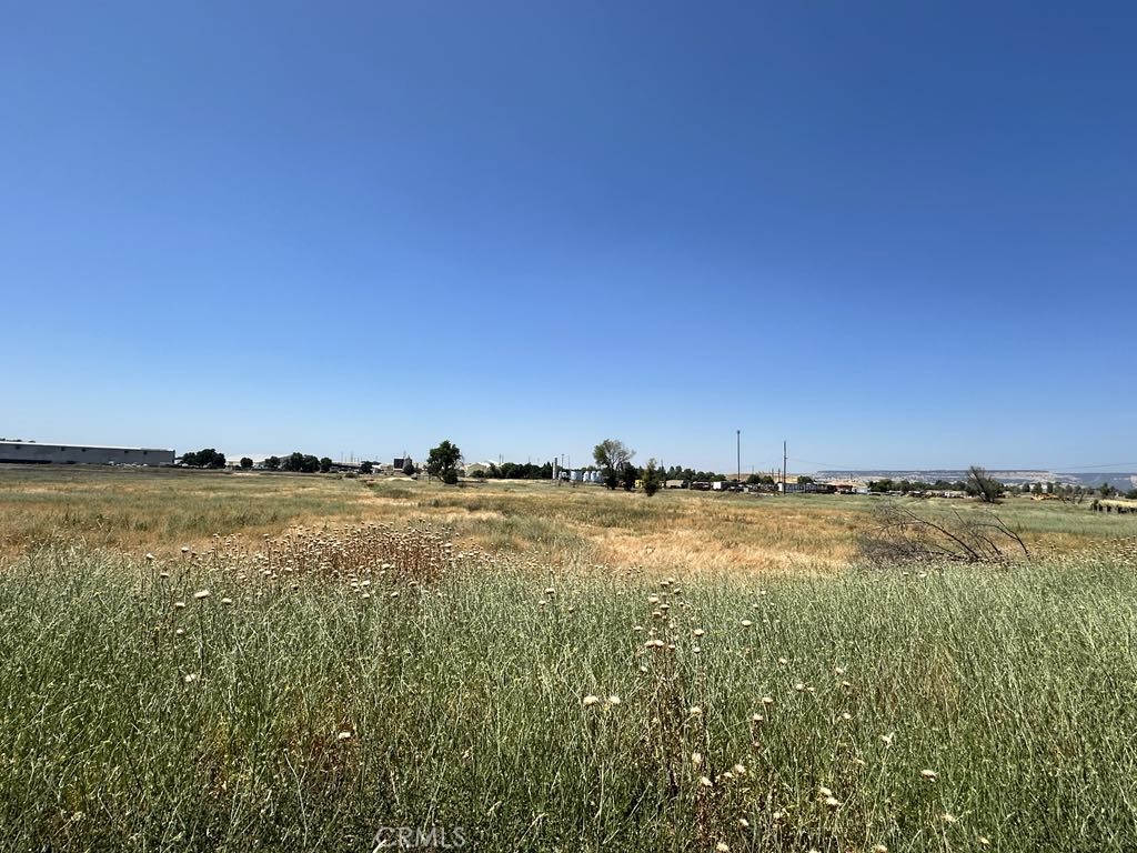 Don’t miss this incredible opportunity to own 9.73 acres of flat, usable land zoned for industrial use. This expansive parcel offers numerous opportunities for development, storage, or business operations. With excellent access and visibility, the property is ideal for a wide range of commercial or industrial projects.
