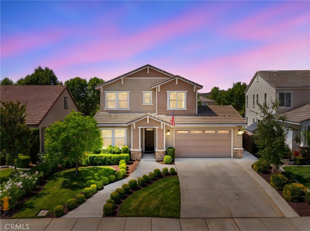 Welcome to the prestigious Heritage Lake community! This stunning two-story home offers a spacious floorplan with four large bedrooms, including a highly sought-after full bedroom and full bathroom conveniently located downstairs — perfect for guests or multigenerational living. The expansive Great Room flows seamlessly into a gourmet kitchen featuring warm maple cabinetry, granite countertops, stainless steel appliances, and a large center island ideal for meal prep and casual dining. A formal dining room provides an elegant space for family dinners and special occasions. Enjoy indoor-outdoor living with a breathtaking California Room and Alumawood patio cover overlooking a beautifully landscaped backyard with turf throughout and serene lake views perfect for entertaining or relaxing outdoors. Slide open the glass doors to blend indoor comfort with fresh air and natural beauty. The attached garage has been thoughtfully transformed into a state-of-the-art home theater, offering an immersive cinematic experience at home, with the option to convert back if desired. Storage abounds with a walk-in pantry, built-in laundry room cabinetry, and an upstairs linen closet to keep your home organized and clutter-free. Upstairs, retreat to the luxurious master suite featuring dual sinks, a soaking tub, separate shower, and a spacious walk-in closet. Two additional bright bedrooms share a full bathroom, providing comfort and privacy for family or guests. Just steps from your front door, a scenic walking trail leads directly to the lake — ideal for morning jogs or peaceful sunset strolls. Living in Heritage Lake means enjoying resort-style amenities including a 7,000 sq. ft. clubhouse, junior Olympic pool, splash pad, a 25-acre lake for catch-and-release fishing and paddle boating, multiple parks, and a new sports park. Plus, you’re within walking distance to top-rated elementary and middle schools, making this location perfect for families. This home perfectly combines modern comfort, thoughtful upgrades, and an unbeatable location. Don’t miss your chance to live the Heritage Lake lifestyle schedule your tour today!