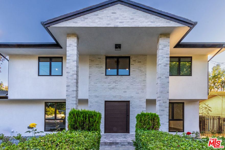 Welcome to 24040 Killion Street, a stunning modern masterpiece nestled in the heart of Woodland Hills. This beautifully remodeled home offers 6 spacious bedrooms and 5 luxurious bathrooms, spread across an impressive 3,000 square feet of living space. Every inch of this residence has been thoughtfully designed with exceptional finishes, creating a seamless blend of style and comfort.Step inside to discover an open-concept layout that flows effortlessly, showcasing high-end materials and contemporary design elements. Outside, the expansive 11,043 square foot lot features a heated pool complete and a jacuzzi, offering the perfect setting for relaxation and entertainment. Whether you're hosting gatherings or seeking a tranquil retreat, this home caters to all your needs. Experience the perfect balance of elegance and functionality in this exquisite Woodland Hills gem.