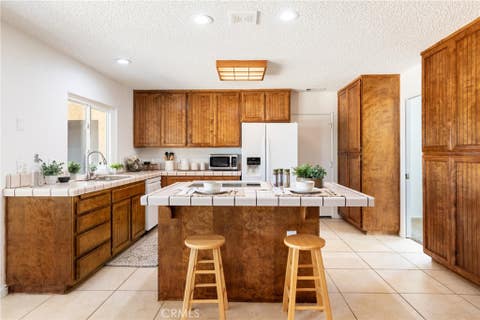 Photo of 57944 Ivanhoe Drive, Yucca Valley, CA 92284 (MLS # JT26178517)