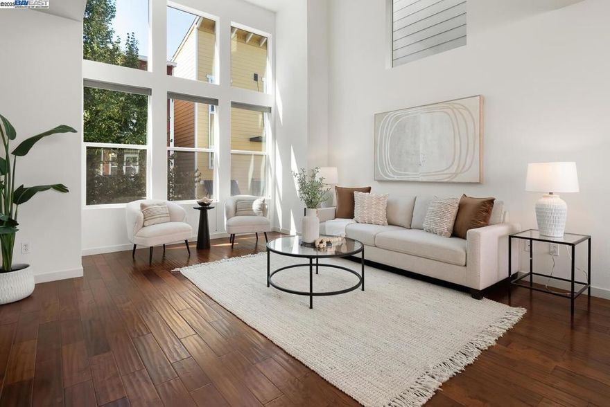 Welcome to this delightful turnkey townhome with no shared walls in the quiet Parklane community! Walking distance to top-rated Hirsch Elementary School, John Horner Junior High School, and Irvington High School. This bright and spacious home features high ceilings, an open-concept layout, and a remodeled kitchen with gas range, stainless steel appliances, and beautiful hardwood flooring - perfect for entertaining. Each bedroom includes its own full bathroom, including a downstairs junior suite with a private fenced patio, ideal for guests or a home office. Additional features include new interior paint, an indoor laundry room, central heating and air conditioning, and an oversized two-car attached garage with extra storage. The low HOA fee of $380 per month includes access to a community swimming pool, greenbelt, and playground. Conveniently located near shops, parks, Lake Elizabeth, the public library, community center, restaurants, supermarket, and the BART station. Easy access to Interstate 880 and Interstate 680. A must see! Open Sat & Sun 1pm-4pm