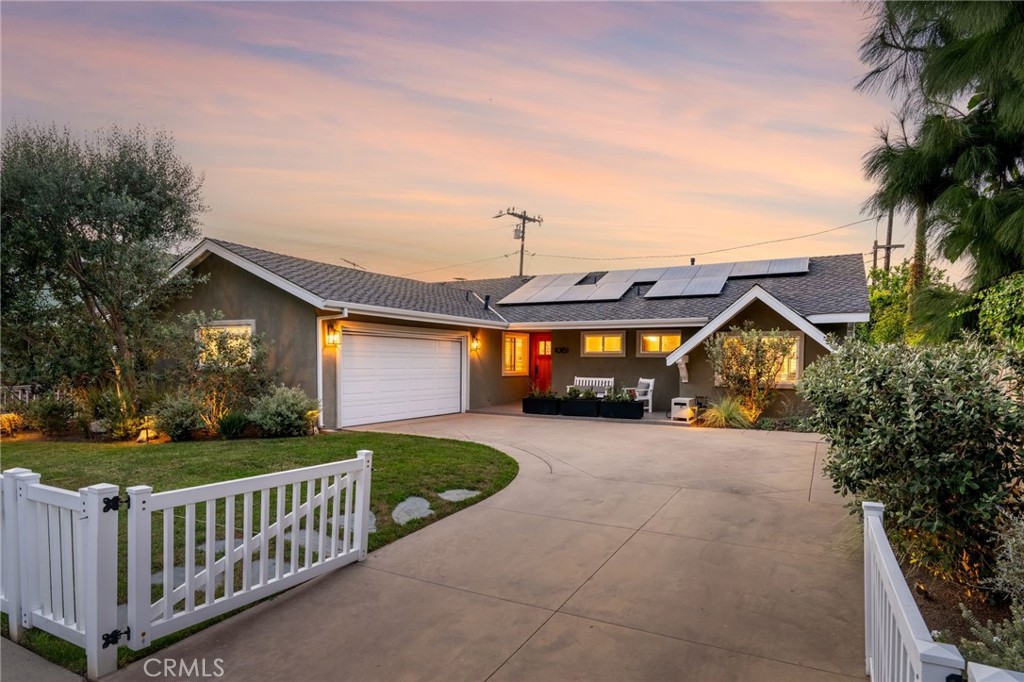Welcome to this beautifully upgraded single-level pool home located in the highly desirable Glen Mar Shores neighborhood of Huntington Beach. Featuring 3 bedrooms and 2 bathrooms, this coastal gem blends modern comfort with thoughtful upgrades and resort-style outdoor living. Step inside to a bright and inviting layout with newer dual-pane vinyl windows and doors, all LED lighting, and a cozy wood-burning/gas fireplace. The kitchen is equipped with brand-new stainless steel appliances, perfect for cooking and entertaining with ease. Enjoy your own private backyard oasis, complete with a Wi-Fi-enabled pool featuring a Baja shelf, waterfall, new pump and lighting (2024), and a new pool heater (2025). Host gatherings around the built-in BBQ and relax under the mature landscape lighting surrounded by 7 pineapple guava trees. Recent Upgrades & Features Include: New Presidential shingle roof, gutters, and fascia (Nov 2024), attic fan (2024) & leak detector installed, water heater (2021), leased solar system, automatic irrigation & exterior lighting system, low voltage landscape lighting, ground drains for optimal drainage, garage door screen, vinyl side gates & white picket fence. Located just minutes from the beach, award-winning schools, parks, and shopping, this move-in-ready home offers the best of Huntington Beach living in a peaceful, established neighborhood. Don’t miss your chance to own this stylish, upgraded retreat in one of South Huntington Beach’s most coveted communities!