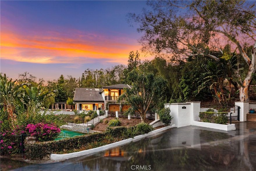 Your own private oasis awaits in the coveted Lemon Heights area of North Tustin. Have you have ever thought of embracing an exquisite lifestyle where you are surrounded by nature's grandeur, yet minutes away from all the modern conveniences . . . . living amongst a plethora of mature trees & landscape, on a sprawling 33,900+ Sq. Ft lot with these gorgeous vistas available from nearly every window, door and vantage point? How about the thought of enjoying a private, resort-inspired pool complete with waterslide, plenty of deck space for guests and lounging, and a gorgeous outdoor entertaining pavilion that effortlessly hosts small get-togethers or grand soirees? How about a gated driveway at the end of a private street, where parking numerous vehicles will not be a concern?  ALL of this is just the beginning at 1761 Lemon Terrace.  Offering 5 roomy bedrooms (one down), plus office and 5 1/2 baths, you'll relish the graciousness of this approx. 4,182 sq. ft. residence.  Absolutely flooded with natural light, this is a home to experience. Soaring ceilings with wood beam detail, dual communal areas both with direct access to the incredible outdoor environs, two cozy fireplaces (family room and primary), and a nearly new kitchen with all the bells & whistles. On the second level, you’ll find a primary suite which is a sanctuary, hosting a large retreat, plenty of closet space, a remodeled bath, and tree-top & pool views.  All secondary bedrooms are generous and well appointed. Three offer extended balcony access, which offers the ideal vantage point for appreciating your surroundings.  Private Pool pavilion, complete with waterslide & play house. Private Pickleball court. Private kids park area complete with jungle-gym equipment.  Private road in to and out of the property.  This is a rare offering in a special location, which offers so much more than an ideal lifestyle. . . . . it’s HOME
