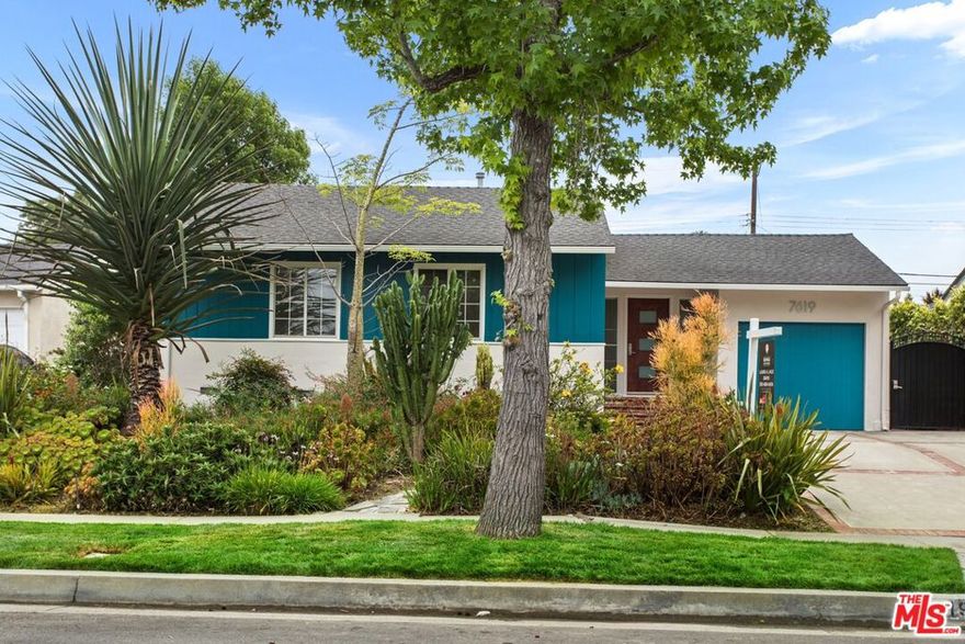Perched on a raised lot, this Westchester home has a lot to offer.  Remodeled and enlarged in 2024 and 2000 and previously owned by gardeners, this spacious home has been lovingly restored and is ready for an easy move in. The charming kitchen features a cherry red all gas Bertazzoni range with wok ring (professional series),Cambria quartz countertops and natural maple cabinets.  The family room stuns with vaulted ceiling with skylight, travertine flooring, sliding glass door to backyard, patio and garage access.  The backyard pulls you in and features mature fruit trees - White Sapote, mature Fuji Apple tree, Navel Orange and Pitaya (Dragon fruit). Tucked in the corner sits a custom pergola with redwood slat roof and lights with a teak dining table and folding dining chairs, a central fountain and wall fountain with exterior lighting are icing on the cake. There are 3 good sized bedrooms with ample closet space as well as 2 full bathrooms.  The primary bedroom  is located in the back of the house directly off the yard and has and ensuite bathroom, walk-in closet with brand new carpet and paint. The additional 2 bedrooms feature newly finished  gleaming wood flooring. The front yards xeriscaping highlights 14 year old Furcraea Macdougalii agavears, 2 large Euphorbia Ingens, a Silk Floss tree and various aloes, bromeliads, and hibiscus.  Additional features include Wainscoting in living room, laundry area with LG washer and dryer, extra wide driveway to accommodate two cars, central heat and A/C, dual pane glass in windows, Rainbird brand sprinkler system, and  copper gutters