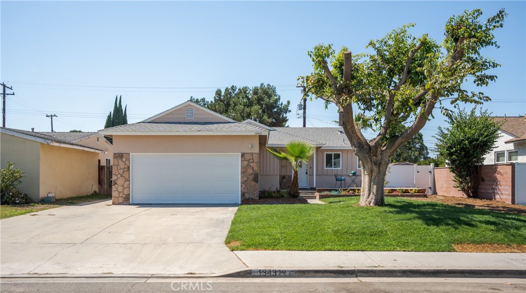 Welcome to 13431 Lilly Street, Garden Grove! Beautifully upgraded home located in a desirable neighborhood. Step inside to a recently remodeled kitchen, bathroom, flooring, painting, recessed lighting and newly replaced windows. Nestled in the center of Garden Grove, this lovely home features a carefully groomed front and backyard that sets the stage for wonderful backyard BBQs and gatherings with family and friends. Inside, you'll find spacious, well-maintained rooms with lots of space for rest and personalization. The convenient two-car garage, with plenty of built-in closet space, provides additional storage and direct access to both the kitchen and family room. Located, near top-rated schools, shopping centers, and with access to the 22, 5, and 57 freeways, this home offers the perfect blend of tranquility and convenience.