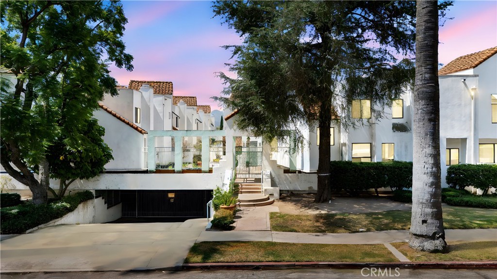 Welcome to Unit #28 at 1340 Glenwood Rd – a peaceful retreat in the heart of Glendale. This beautifully updated 2-bedroom, 2-bathroom condo offers 980 sq ft of bright, modern living space with brand new flooring, new appliances, and a smart, open layout that blends comfort and functionality. Enjoy the convenience of in-unit washer and dryer, along with two coveted side-by-side parking spaces. Located in a quiet, well-maintained community, this home is just minutes from Costco, Trader Joe’s, and IKEA, with easy access to major freeways. Spend your afternoons at nearby Brand Park or explore the charming shops and cafés of Kenneth Village just around the corner. Whether you're a first-time buyer or looking to downsize in style, Unit #28 delivers the ideal combination of location, lifestyle, and tranquility—don’t miss this rare opportunity!