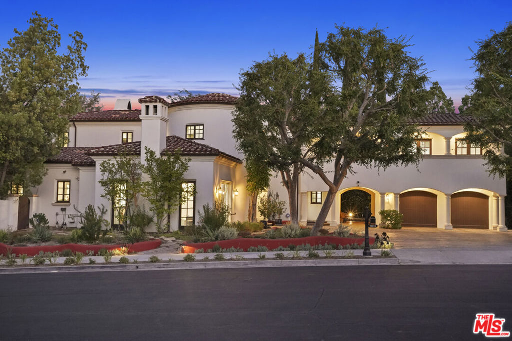 Welcome to a stunning Spanish Revival estate sited on a serene cul-de-sac centered in the exclusive, gated enclave of Monte Verde Estates. Crowning a acre, this private retreat is surrounded by soaring trees and lush greenery. A unique combination of old world elegance with the style, design and amenities ideally suited for today's modern living. Inside, the open floor plan flows smoothly from one room to the next, with abundant natural light and high-end finishes throughout. Baths are dressed in fine tile, fixtures and finishes. The kitchen is an open concept culinary delight designed for the home chef and features a full array of state-of-the-art professional appliances including a 6-burner Wolf professional range, double oven and SubZero fridge. Opening to the family room it becomes the perfect gathering place for friends and family. With an emphasis on lifestyle, the outdoor space defines Southern California living at its finest as a continuum of French doors reveal a truly unique backyard resort oasis fulfilling every entertainment possibility. Replete with built-in BBQ, winding river pool, expansive spa, foot bridges, outdoor copper fireplace, multiple loggias, putting green with built in seating and dining patios. Designed by celebrity landscape architect Willem Van Muyden, it's a one of a kind venue for warm, relaxed poolside lounging by day, cool gatherings and endless entertaining by night. A lux primary suite with private view terrace, dual walk-in closets and day spa inspired bath round out the comfortable accommodations. Highlights include wine room, wet bar, media room, multi-use rec room, updated HVAC, solar panels, 'smart' home security cameras, sensors and thermostats, oversized 2-car garage with additional porte cochere with ample guest parking and a fantastic en suite studio/gym/office with private entrance and patio! This stunning property is a case study in quality craftsmanship, built with care and timeless style. This is the place where you want to live Welcome!