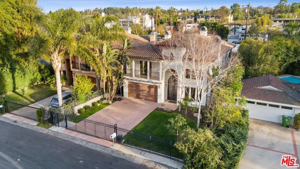 Photo of 23042 Ostronic Drive, Woodland Hills, CA 91367 (MLS # 25548819)