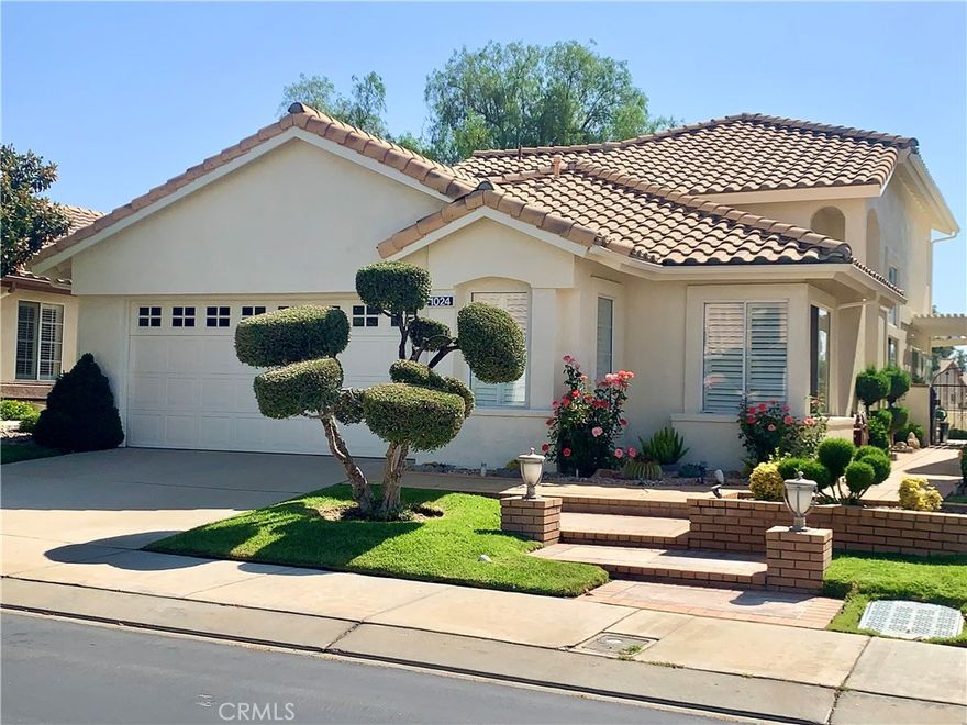 Welcome to this stunning upgraded Muirfield Model! This beautiful property, located in the lovely gated 55+ golf community of Sun Lakes Country Club, boasts an eastern exposure to the fairway and offers spectacular views of the San Gorgonio and San Jacinto Mountains. This charming home features three bedrooms and three baths. The entry leads into a lovely formal living and dining room with a grand staircase and vaulted ceilings. The open-concept kitchen, dinette, and family room (with fireplace) seamlessly connect to the back living patio, creating an ideal indoor-outdoor entertainment experience. The kitchen offers a lovely remodel that would capture anyone's eye. Some of the upgrades in the home also include flooring and plantation shutters. The main floor includes a primary suite that offers breathtaking views and a luxurious feel. The primary bathroom features dual sinks, a spacious walk-in shower, and a walk-in closet with custom built-in storage. You will also find a perfect downstairs powder room for all your guests. Upstairs, you’ll find two generously sized bedrooms and a full bath. The home provides direct access to a two-car garage. Outside, the property offers a lovely, well-maintained, fully landscaped yard creating beautiful curb appeal. The property is nestled off the Champion Golf Course and is complemented by numerous community amenities, including three pools and spas, billiards, tennis, pickleball, paddle courts, bocce ball, two golf courses, and pro shops with putting greens and a driving range. The community also offers a restaurant/lounge, café, sports bar, ballroom, and a variety of clubs and activities. Furthermore, Sun Lakes Country Club is conveniently located near world-class shopping, casinos, and Palm Springs Airport, providing plenty of entertainment options. Come see if this is the property you've been waiting for.