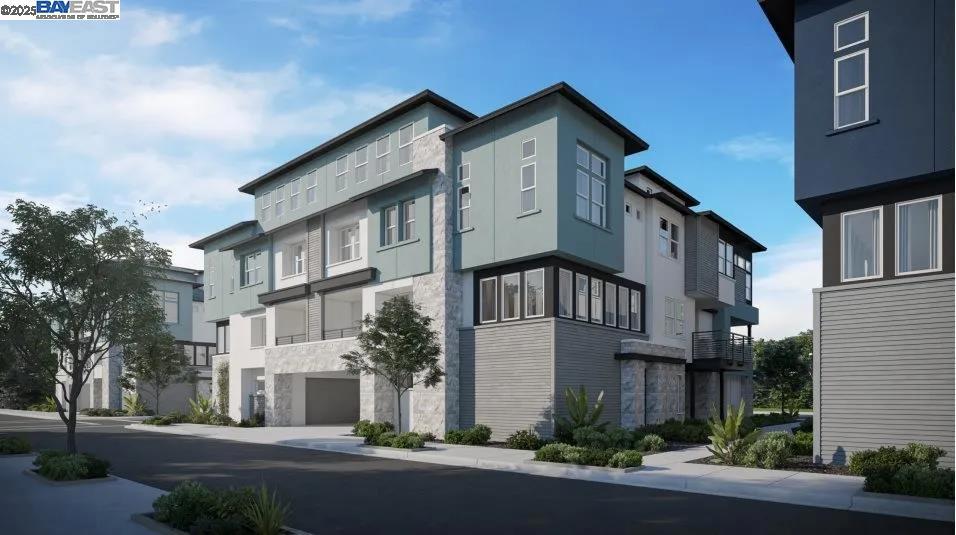 Experience this thoughtfully designed four-level floor plan that blends style, comfort, and convenience. The entry level includes a spacious two-car garage, while the main living areas unfold on the second floor with an open living and dining space that flows to a private balcony—perfect for entertaining or relaxing outdoors. All bedrooms are located on the third level, highlighted by the luxurious owner’s suite with a serene retreat, spa-inspired bath, and generous walk-in closet. The top floor features a versatile loft, ideal as a home office, media lounge, or creative space to fit your needs. Perfectly positioned within walking distance to the upcoming elementary school and BART, and just minutes from freeway access to I-680 and I-580, this home also offers close proximity to popular shopping centers, dining, and everyday conveniences—bringing modern living and lifestyle ease all together.