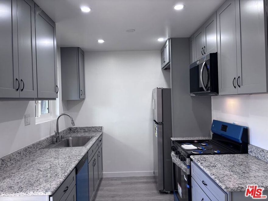 Refurbished/ remodel two story Townhouse style unit located in the heart of North Hollywood. Centrally located to all valley local freeways. Including the following: 101 frwy, 170 frwy, 5 frwy, 134 and 2 Glendale frwy.  All new Windows with central heat and air. Move in Ready Call listing agent and or management company for showing instructions.