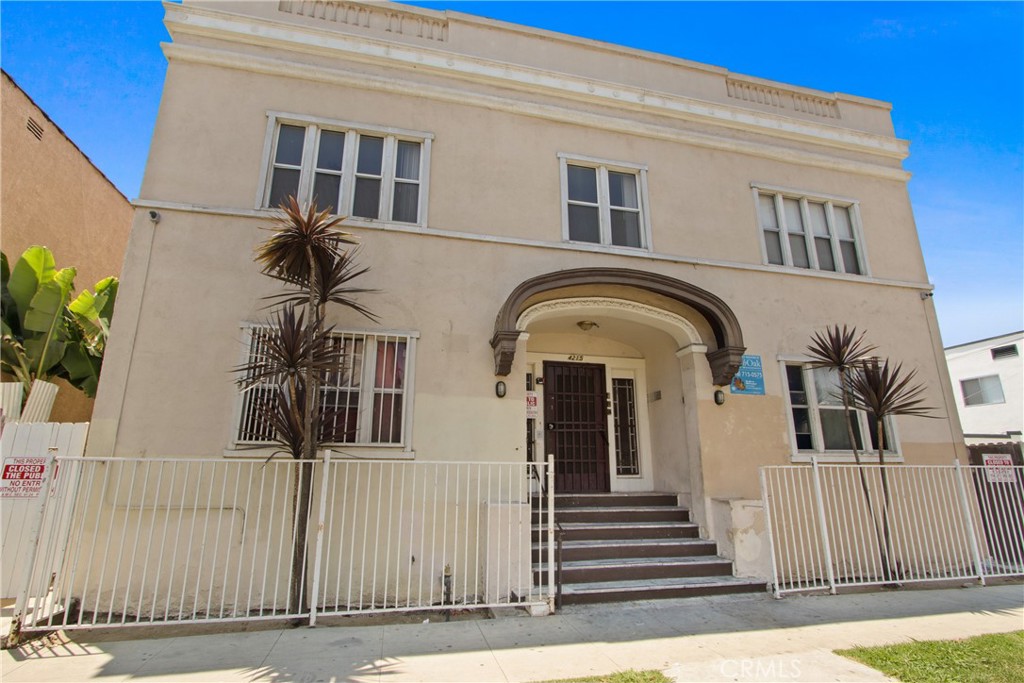 Welcome to 4215 S Kansas Avenue, a charming and well-maintained 24-unit multifamily property located in the heart of Los Angeles’ vibrant Vermont Square neighborhood. Built in 1924, this classic two-story Spanish-style building offers a mix of spacious studio and one-bedroom units, each featuring unique vintage details, high ceilings, and abundant natural light. Select units have been tastefully updated with modern finishes while preserving their original character. The property sits on a quiet, tree-lined residential street just one block from Exposition Boulevard and minutes from USC, Exposition Park, the Natural History Museum, and the Metro E-Line. Additional amenities include on-site laundry facilities and secure gated entry. This is an ideal opportunity for investors seeking stable income in a high-demand rental market with strong upside potential.
Don’t miss your chance to own a piece of Los Angeles history in one of its most dynamic and transit-connected communities!