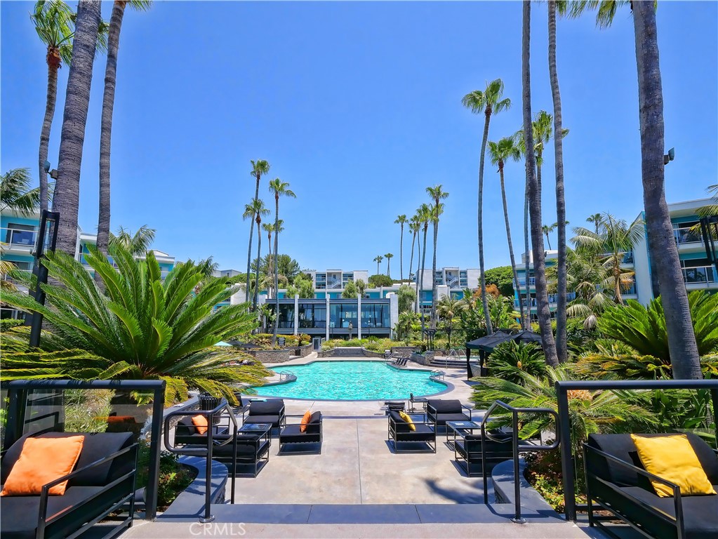 FLEXIBLE LEASE TERM AND FLEXIBLE UNFURNISHED OR FULLY FURNISHED. Oceanfront living and ocean views are highlighted in this Redondo Beach condo. The living/dining area and the bedroom have access through large sliding glass doors to a tiled balcony overlooking a the ocean and Redondo Beach Pier. Floor-to-ceiling mirrors opposite the sliding glass doors reflect ocean views throughout the living space. The remodeled kitchen has quartz countertops, and upgraded appliances. Furnishings include all linens, tableware, and cookware. There are two assigned parking places. Multiple EV charging stations are available in the gated visitor parking area. EV parking to come in assigned parking spaces. There is a full-time on-site manager. This condo has great views of sunsets, and in summer the colorful sails of sailboats returning to the harbor is a special treat. This complex is unique in that residents have access to two beautiful pools surrounded by beautiful landscaping and palm trees. The smaller ocean-view pool’s turquoise water has a stone deck along with stacked stone retaining walls. This pool area also includes a hot tub, pool furniture, stainless steel barbecues, and a fire pit. The large pool’s stunning landscaping and amenities provide a vacation-like feel. Upgraded furniture, cabanas, a large hot tub, barbecues, and fire pits overlook the pool, the ocean, harbor, and the bike path. There is a gym near the pool with views of the pool, palm trees, and ocean. A great small restaurant is also next to this pool. Nearby: Direct access to the Pier is also available from the condo complex and adjacent to the Santa Monica bike path. Other attractions just outside the gated complex include a weekly Farmer’s Market, waterfront restaurants, paddle boat, kayak, whale watching tours and bike rentals — and of course, the beach! Nearby are the Hollywood Riviera Village, Hermosa Beach, and Manhattan Beach. LAX is seven miles away and Downtown LA is 20 miles away. No Pets.