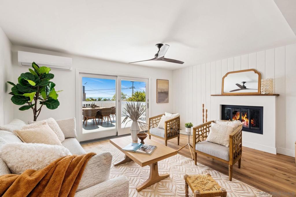 Variance granted 2-4 Units. ADU LEASED FOR $3,300/MO - moved in on 7/1/25 with lease thru 12/31/25. Experience breathtaking ocean views and coastal luxury in this charming coastal chic property that seamlessly blends modern convenience with designer finishes that enhance both the primary residence and newly built ADU. Sweeping ocean views can be enjoyed from three of the home's five bedrooms, as well as the open-concept kitchen and living area. The reimagined kitchen boasts high-end finishes and thoughtful details, including a pull-out trash drawer, open shelving, an under-counter microwave, a beverage refrigerator, and a spacious island with bar seating. The primary bedroom is a true retreat, featuring two private decks—one with stunning southwest-facing ocean views and the other with breathtaking northwest-facing ocean views. A newly constructed detached 411 SF 1-BD ADU sits atop a 1-car garage, offering incredible ocean views from both the bedroom and living space. On the third level, a private rooftop deck takes full advantage of the panoramic coastline—arguably some of the best ADU views in San Diego County. The ADU features in-unit laundry, split HVAC units in both the L/R in Bed, and designer finishes. Endless possibilities await—rent out the ADU, live in it and lease the main house, or use it as a private retreat for guests or family. Don't miss this rare opportunity to own a fully updated coastal home with unmatched ocean views, high-end finishes, and ultimate flexibility. !!