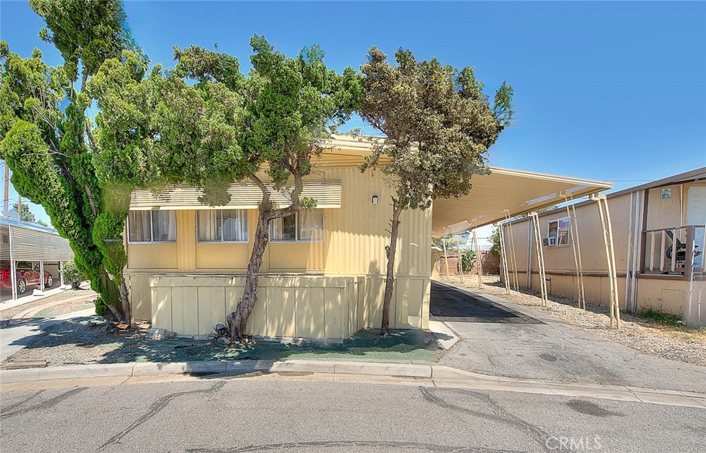 This is a 3 bedroom, 2 bath mobile home, originally a 2-bedroom, owner added a wall to make it a 3 bedroom. Home features comfortable enclosed outdoor patio area and a nice area rear yard to plant a garden or use as a play area for kids or hang out and BBQ area. Home also features a large master bedroom with dressing area and its bathroom, large living room, dining area, inside laundry area, with a little TLC this home could be great for your family, Park amenities include pool, club house for parties and events, kids play area, pet friendly community.
