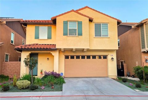 Photo of 906 Lemon Drive, Pomona, CA 91768 (MLS # GD26105788)