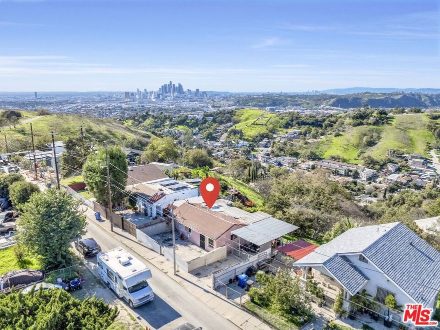 Increasingly rare opportunity for panoramic vistas in the rapidly developing ridgeline of El Sereno. Frame the Hollywood Sign and Griffith Park Observatory from the bedroom window. Construct a cascading structure, and take in the entirety of the unobstructed DTLA skyline from every porch and balcony. Enjoy the fireworks from Dodger Stadium and the fresh breeze that travels up from the lush valleys below. This is one of those opportunities that you'll be kicking yourself for 10 years down the line. Realize the dream as an investor or end user. Property is on septic with city utilities.